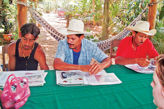 Villagers gain instruction from Dr. Allen Pederson and his team