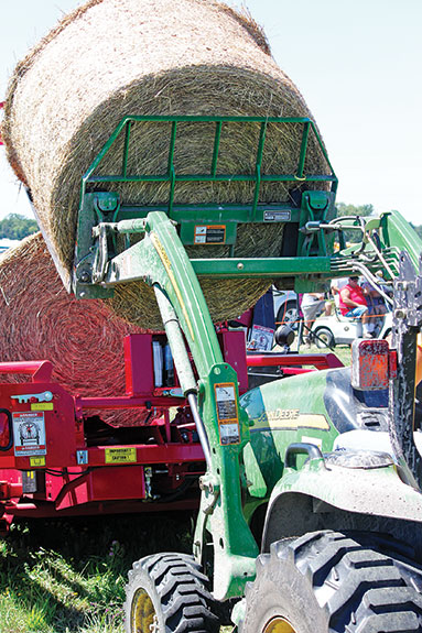 Loading a round bale