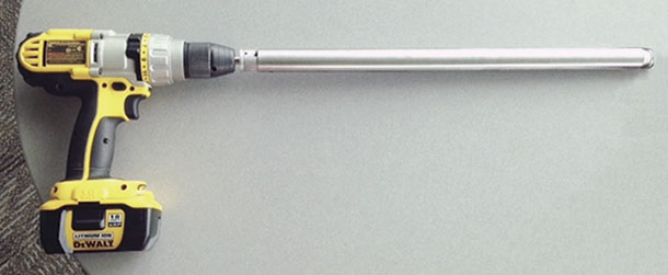 A sampling probe attached to a drill
