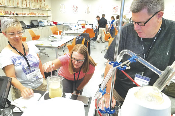 Teachers practice distillation labs at a KCBA Seed to STEM workshop